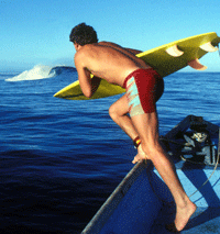 Kevin Naughton jumping into a perfect session at Cloudbreak, Fiji